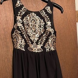 Black and gold sequins dress